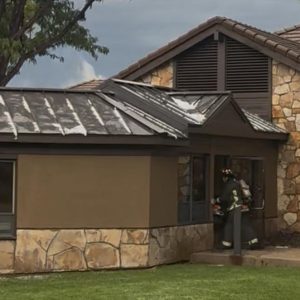 Read more about the article Fire crews brave hail, lightning storm to battle attic fire at care facility