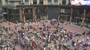 Read more about the article Pitch a single friend by PowerPoint? Dating trend hits McGregor Square's Jumbotron