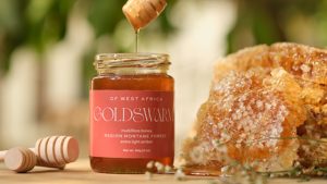 Read more about the article Broncos-themed whiskey features honey produced by Colorado man's African-based company